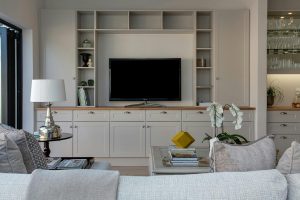 white living room with custom wood shelving toronto