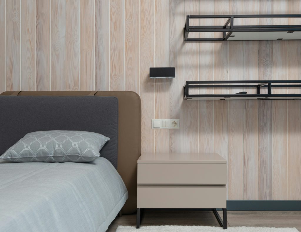 bedroom with shelves for condo storage
