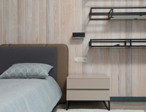 bedroom with shelves for condo storage